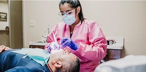 Patient receiving dental treatment