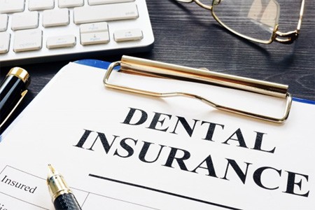 a dental insurance form for the cost of dental crowns