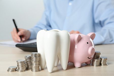 Coins and a piggy bank