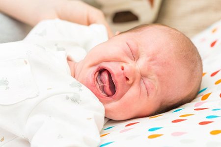 Close-up of fussy infant